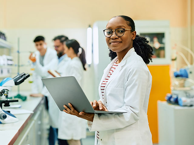 Female scientist with laptop